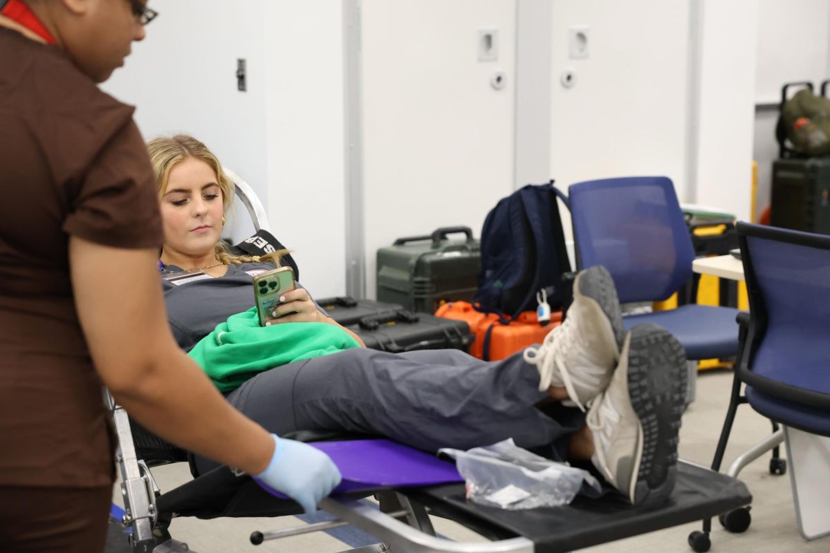 Student Kajsa Brinkerhoff waits while pumping her blood to donate in support of the Carter BloodCare Semi Annual Blood Drive. As a PCT student, Brinkerhoff is planning on participating in this event in the spring as well. Dual Credit Nursing students are getting real experience in the field. 