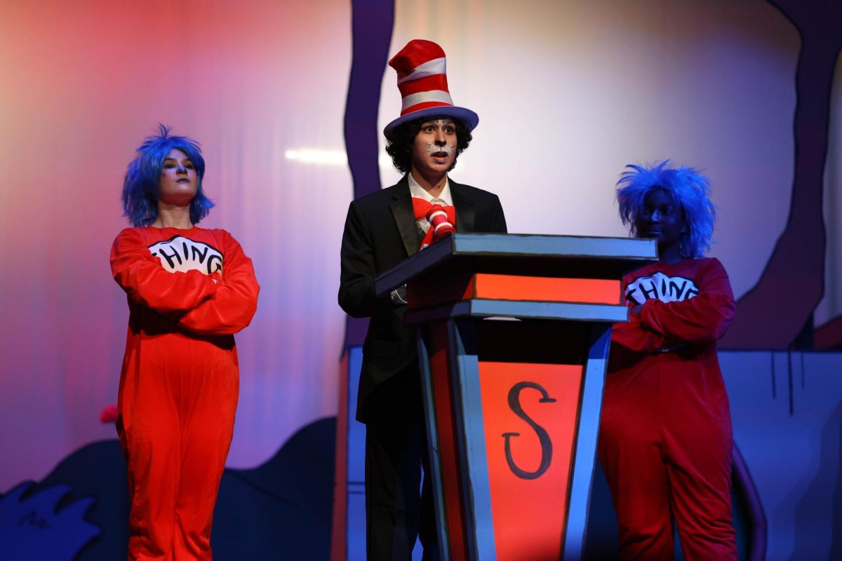 Backed up by Thing 1 and Thing 2, Corvus Mckay performs his role as The Cat In the Hat. McKays character narrates the story throughout the Musical. He is explains the trial the Horton is on during the second half of the show. My favorite part about our show is the community, sophomore McKay said. I feel like weve all grown so close to each other. Ive made some really good friends through the show. Its just really fun.