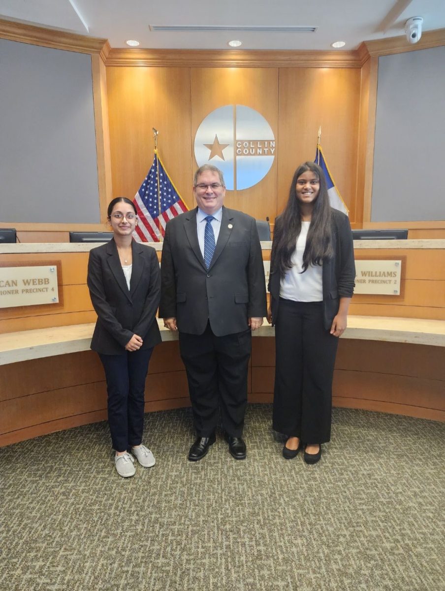 Krishitha Pingeli, Commissioner Hale of Collin County, and Vaishnavi Tatineni when meeting the commissioner. They met with him to advocate for raising the impoverished care floor so that they could expand access to essential healthcare services to those in need. 
