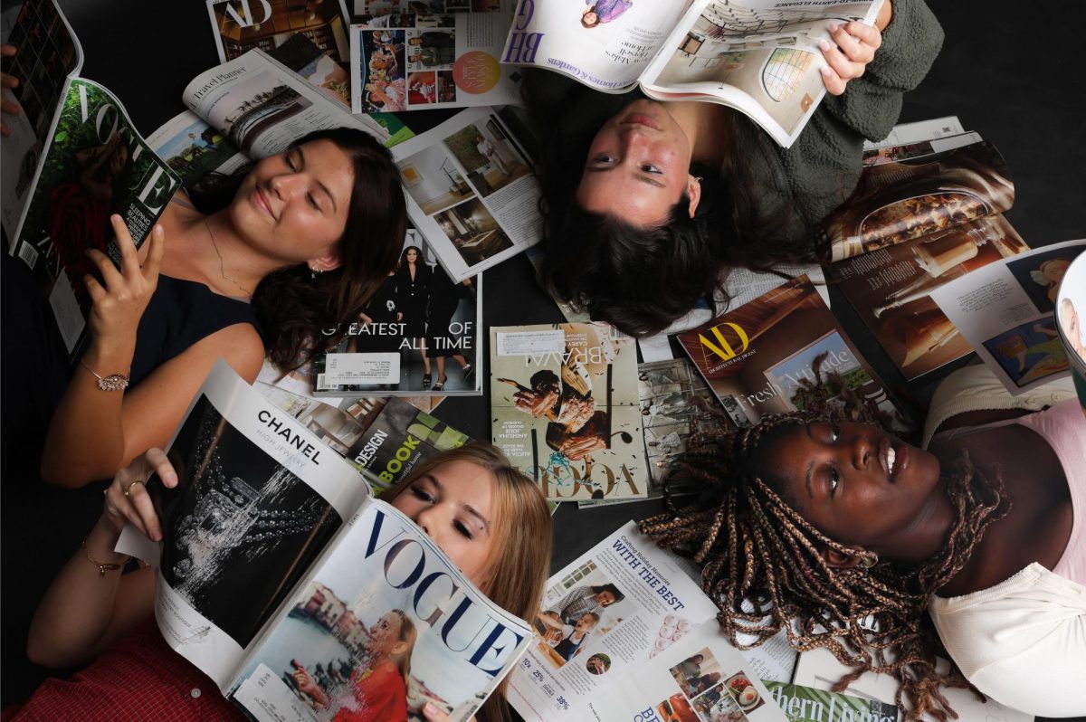 This is a photoshoot of the fashion practicum students: Kylie Corbridge, Malia Sofi, Arianna Day, and Kelsey Rohde. The point of the photoshoot is to show the students gaining inspiration from design magazines such as Vogue in an artistic, chaotic way. This photo also won superior for the planned portrait category in TAJE's Fall Fiesta Contest. 

