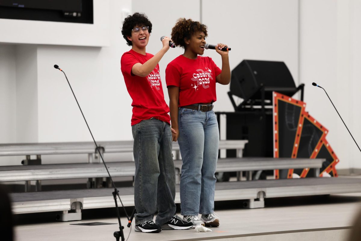 Seniors Corvus McKay and Jaida Rivera sing a duet from the musical "Little Shop of Horrors" at the choir cabaret.
